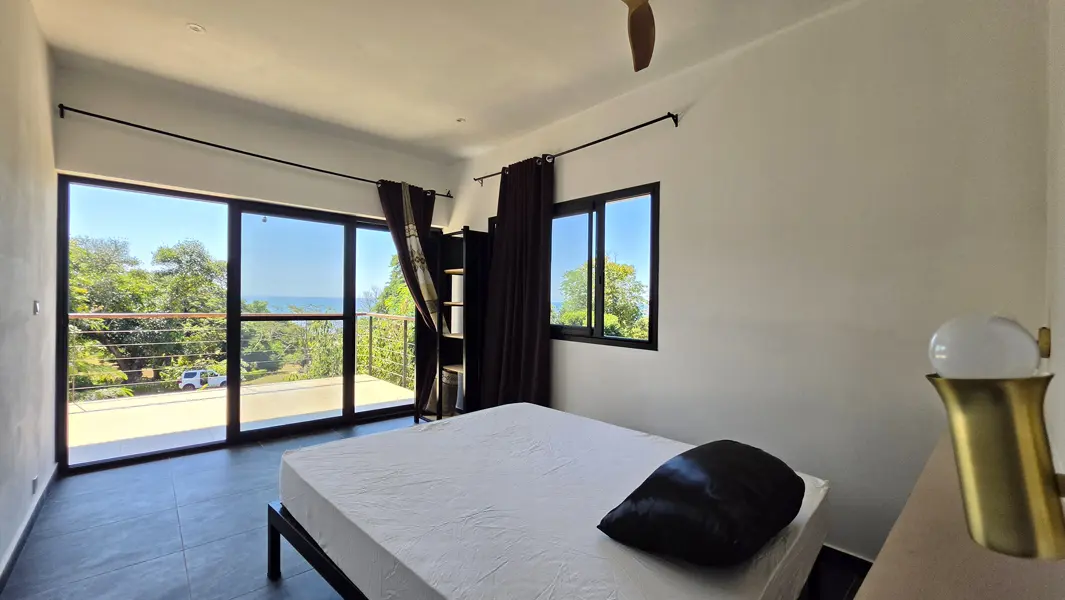 Deuxième chambre lumineuse avec vue mer dans une villa contemporaine à Nosy Be